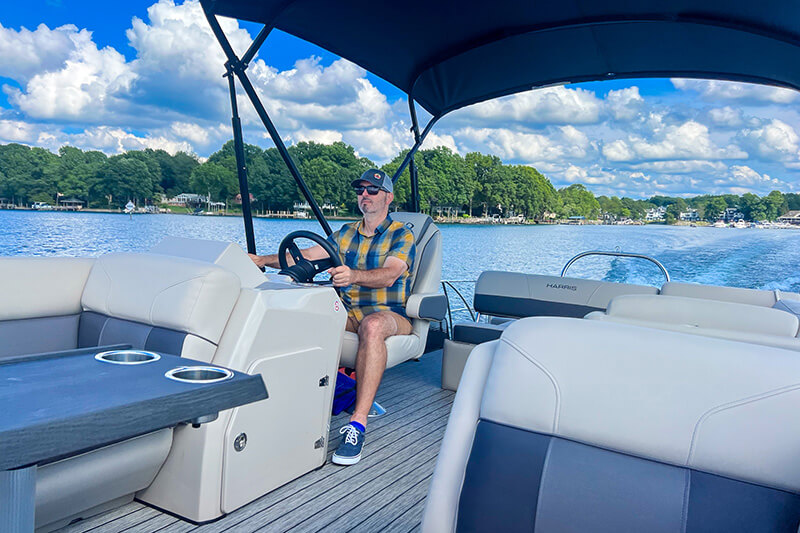 Jeff Hamm driving a boat on Lake Norman
